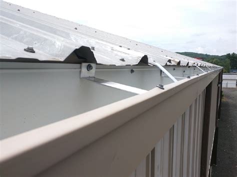 gutter brackets for metal building|installing gutters on metal building.